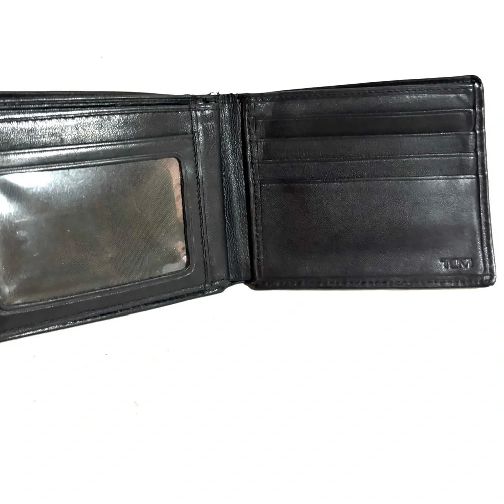 Tumi Sleek Black distressed Leather Wallet